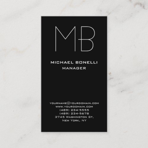 Vertical black white monogram business card