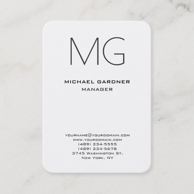 Vertical black white monogram creative unique business card (Front)