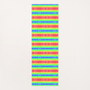 Vertical image of a vibrant, rainbow-colored yoga mat