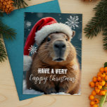 Very Cappy Christmas Capybara Christmas Holiday Postcard<br><div class="desc">Send some Capy Christmas cheer this holiday season with this funny Christmas card featuring everyone’s favorite chill animal – the capybara! Decked out in a festive Santa hat and surrounded by snowflakes, this card brings an extra dose of humor to your holiday greetings. Perfect for adding a quirky touch to...</div>
