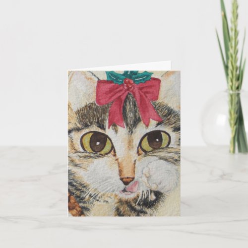 very cute gray tabby kitten with red bow fassist holiday card