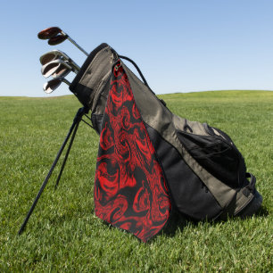 Very stained red spiral parts on black background  golf towel