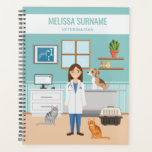 Veterinarian Woman Vet Girl Animal Doctor Blue Planner<br><div class="desc">Destei's original cute cartoon illustration of a veterinarian woman standing in an examination room of a veterinary clinic. The veterinarian is wearing a white laboratory coat, blue scrubs and she has a stethoscope around her neck. The veterinarian woman has long brown hair and a smiling face expression. The room has...</div>