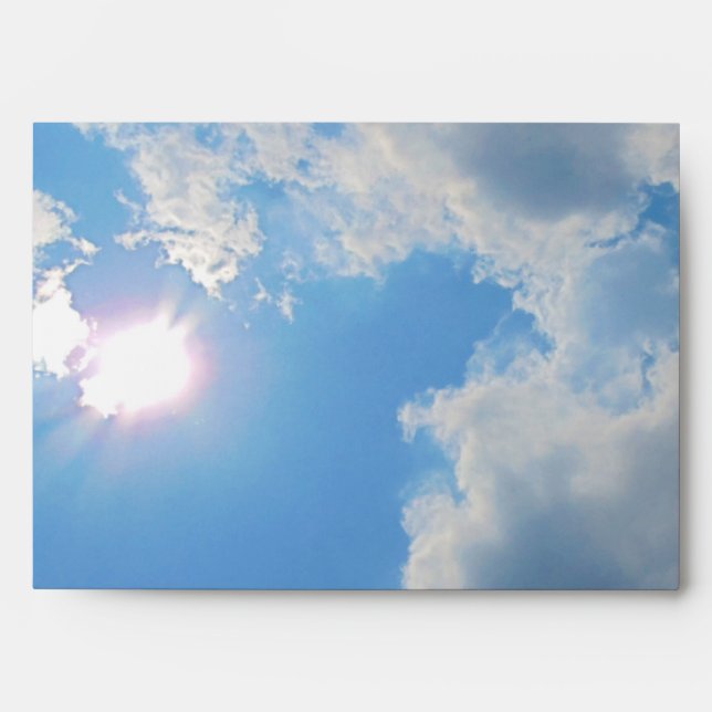 Vibrant blue sky with sun and clouds photo envelope (Front)