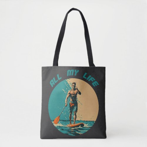 Vibrant design with man on sup paddle board tote bag