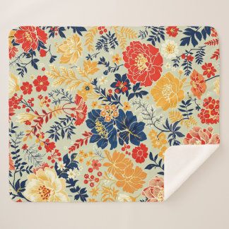 Vibrant flora red, yellow and blue on white sherpa blanket