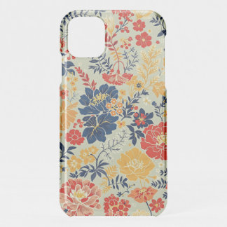 Vibrant flora red, yellow and blue on white iPhone 11 case