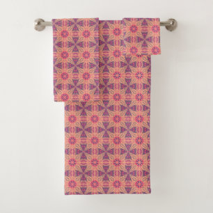 vibrant geometric pattern in pink, purple, orange bath towel set