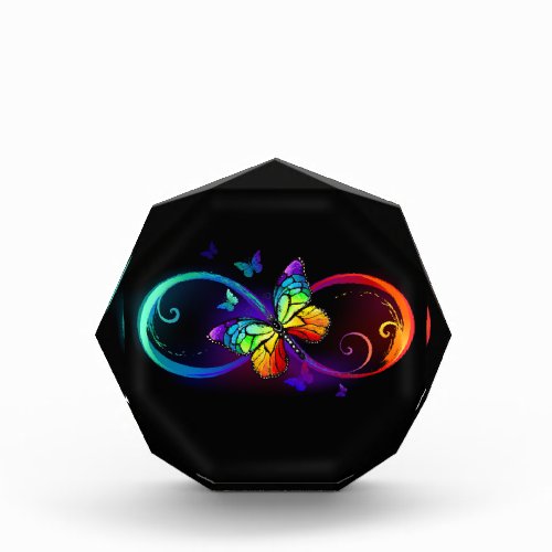 Vibrant infinity with rainbow butterfly on black acrylic award