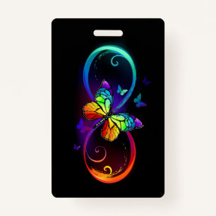 Vibrant infinity with rainbow butterfly on black badge