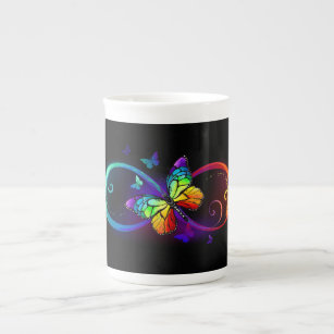 Vibrant infinity with rainbow butterfly on black bone china mug