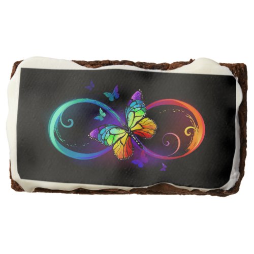 Vibrant infinity with rainbow butterfly on black brownie