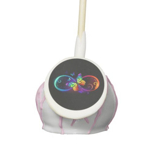 Vibrant infinity with rainbow butterfly on black cake pops