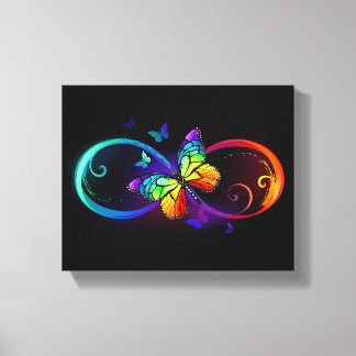Vibrant infinity with rainbow butterfly on black canvas print