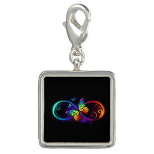 Vibrant infinity with rainbow butterfly on black charm