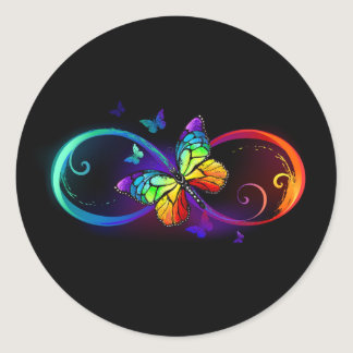 Vibrant infinity with rainbow butterfly on black classic round sticker