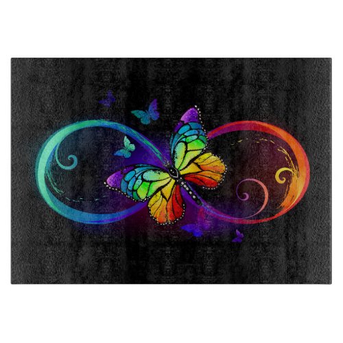 Vibrant infinity with rainbow butterfly on black cutting board