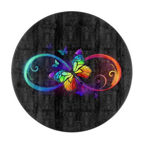 Vibrant infinity with rainbow butterfly on black cutting board