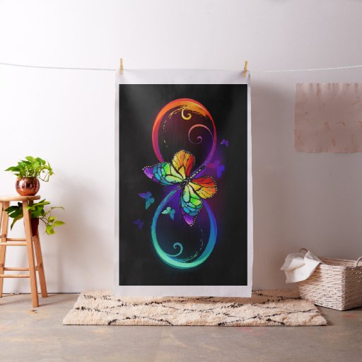 Vibrant infinity with rainbow butterfly on black fabric