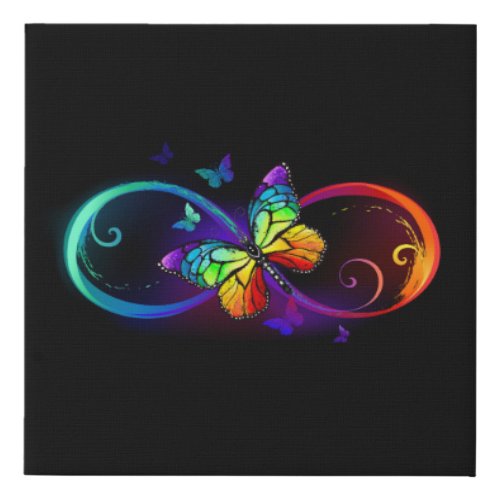 Vibrant infinity with rainbow butterfly on black  faux canvas print