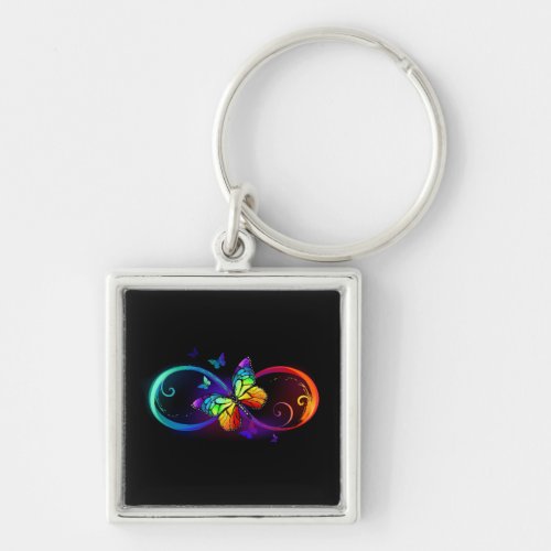 Vibrant infinity with rainbow butterfly on black keychain