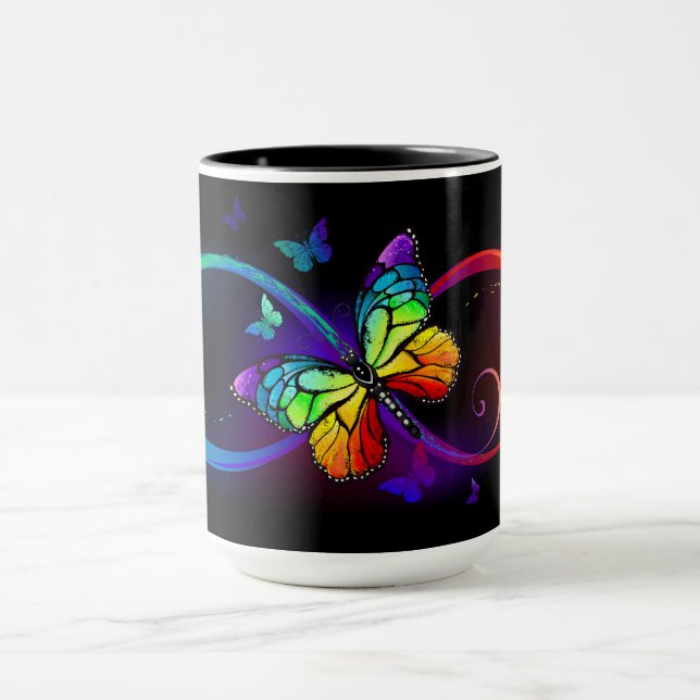 Vibrant infinity with rainbow butterfly on black  mug (Center)