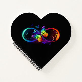 Vibrant infinity with rainbow butterfly on black notebook