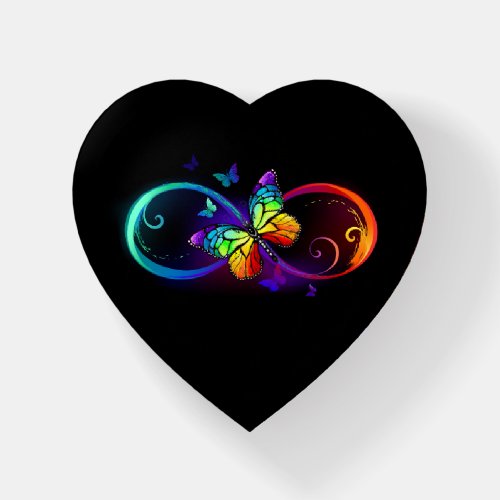 Vibrant infinity with rainbow butterfly on black paperweight