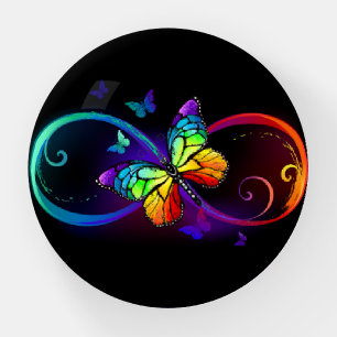 Vibrant infinity with rainbow butterfly on black paperweight