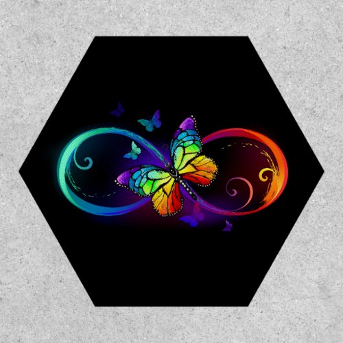 Vibrant infinity with rainbow butterfly on black patch