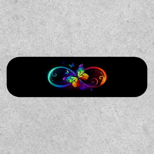 Vibrant infinity with rainbow butterfly on black  patch