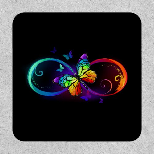 Vibrant infinity with rainbow butterfly on black patch