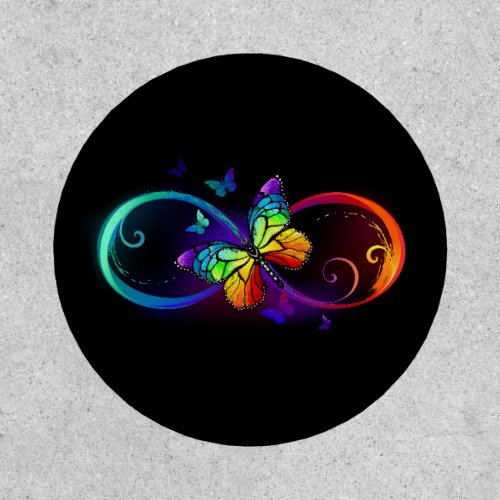 Vibrant infinity with rainbow butterfly on black patch