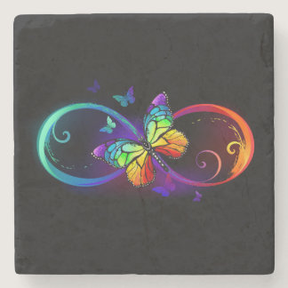 Vibrant infinity with rainbow butterfly on black stone coaster