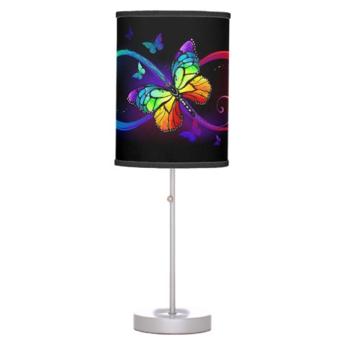 Vibrant infinity with rainbow butterfly on black table lamp