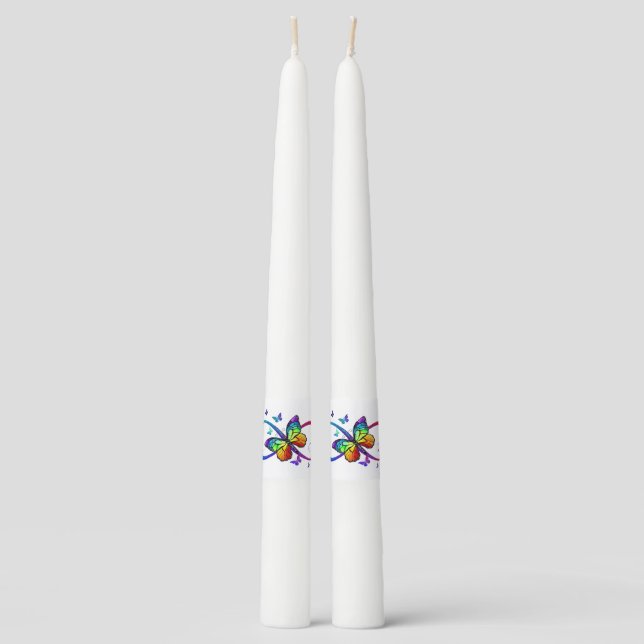 Vibrant infinity with rainbow butterfly on black taper candle (Front)