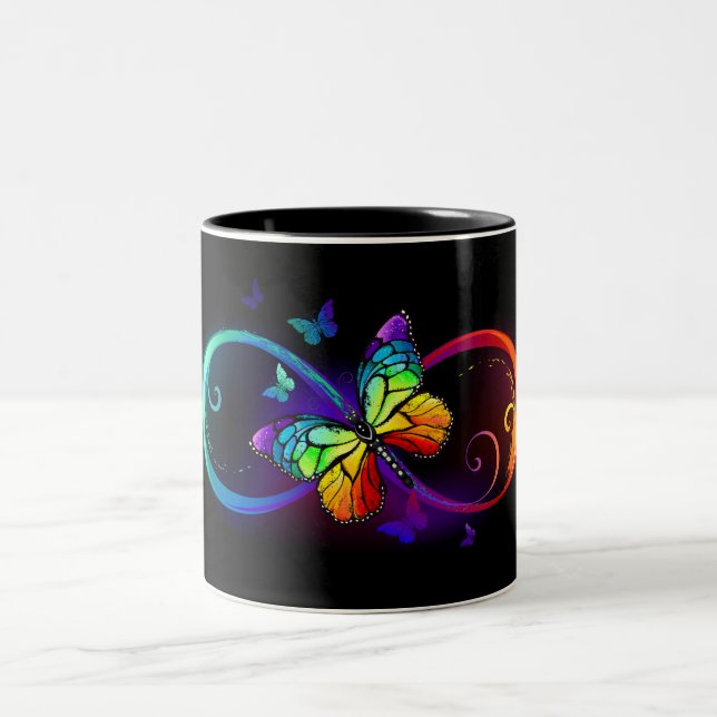 Vibrant infinity with rainbow butterfly on black Two-Tone coffee mug (Center)
