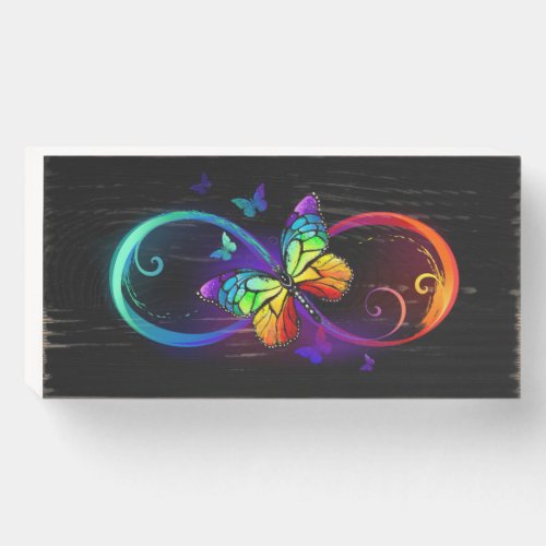 Vibrant infinity with rainbow butterfly on black  wooden box sign