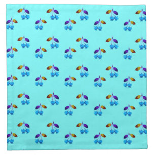 Vibrant light blue cherries   cloth napkin
