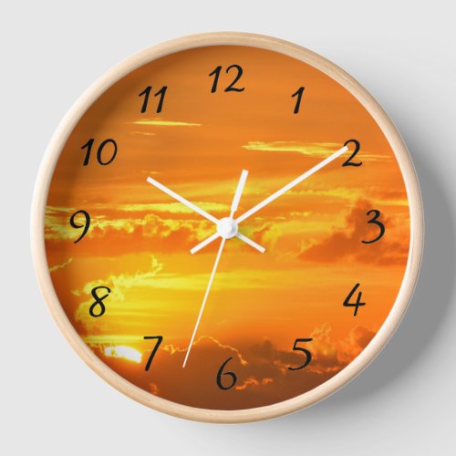 Vibrant orange sky Sunrise round wall clock