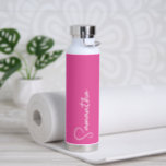 Vibrant Pink and White Personalized Water Bottle<br><div class="desc">This personalized insulated bottle features your name in white handwritten script typography over a solid vibrant pink background. Great for keeping those summertime drinks cold or for adding warm feeling for your loved ones over the cold months! Makes a great bridal party gift or a gift for mom! Minimalist font...</div>