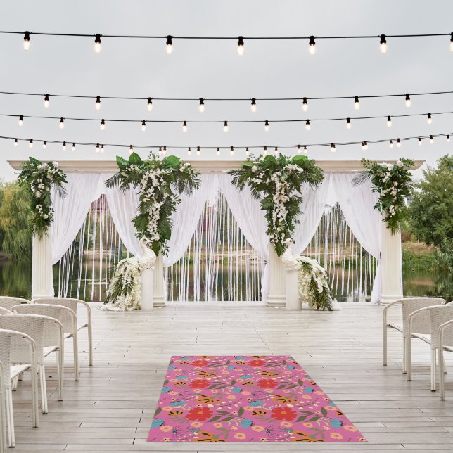 Vibrant pink rug with red, blue and orange flowers (Insitu (Wedding 1))