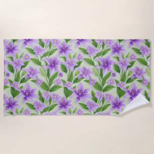 Vibrant Purple Lilies With Green Leaves Beach Towel