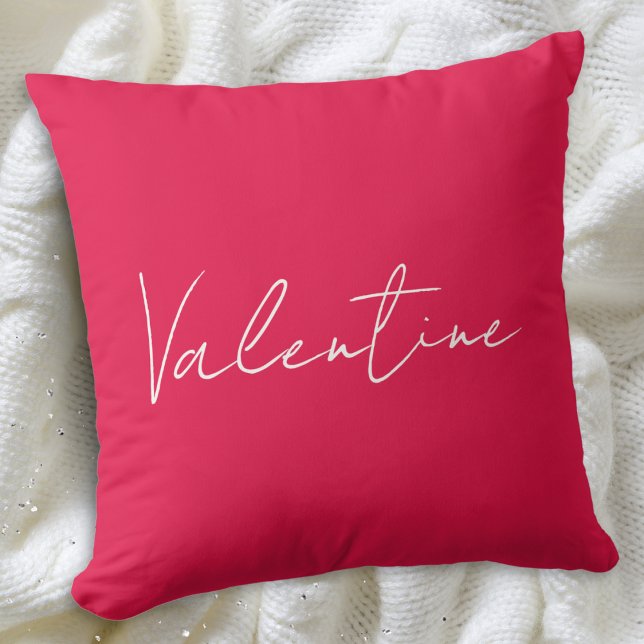 Vibrant Red Elegant Custom Message Valentine's Day Throw Pillow (A throw pillow in red, with 'Valentine' in stylish script on the front, and custom text on the back)