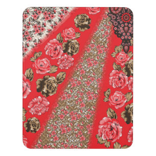 Vibrant red fabric featuring intricate floral and door sign