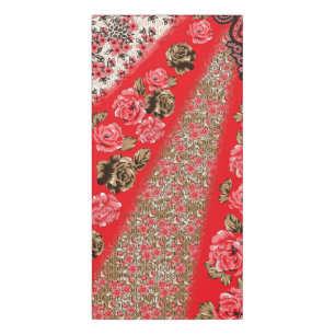 Vibrant red fabric featuring intricate floral and  door sign