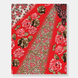 Vibrant red fabric featuring intricate floral and  foam board