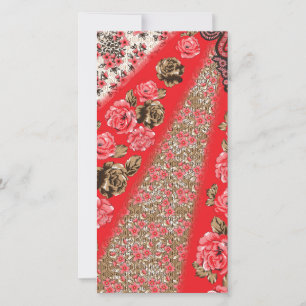 Vibrant red fabric featuring intricate floral and holiday card
