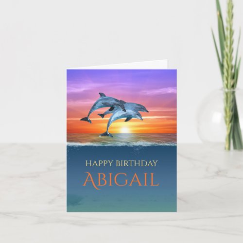 Vibrant Sunset Dolphins Jumping Ocean Birthday Card