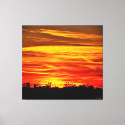 Vibrant Sunset Over Trees Canvas Print